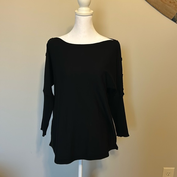 Cable and gauge black sweater 3/4 length sleeves with gold bottoms down sleeves. - Picture 1 of 4
